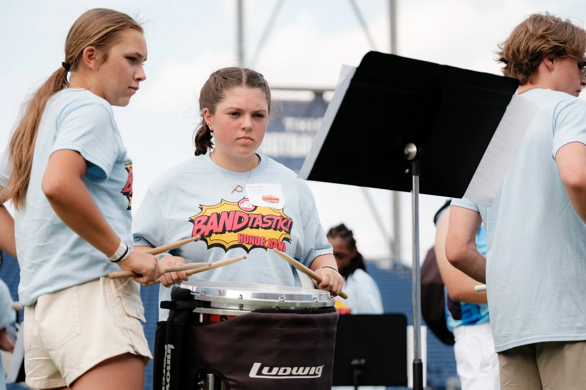Two Honor Band participants playing snare drum.