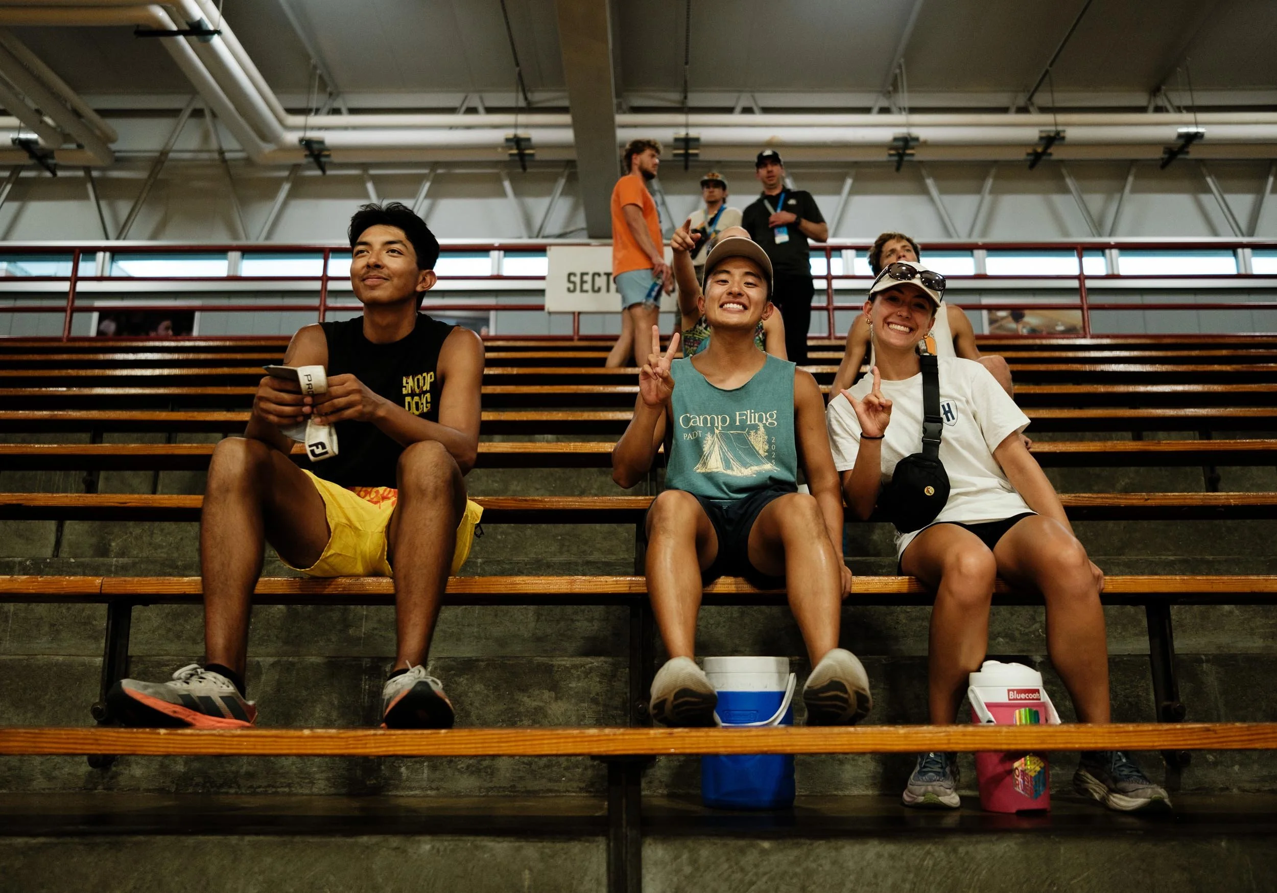 Performers smiling at the camera.