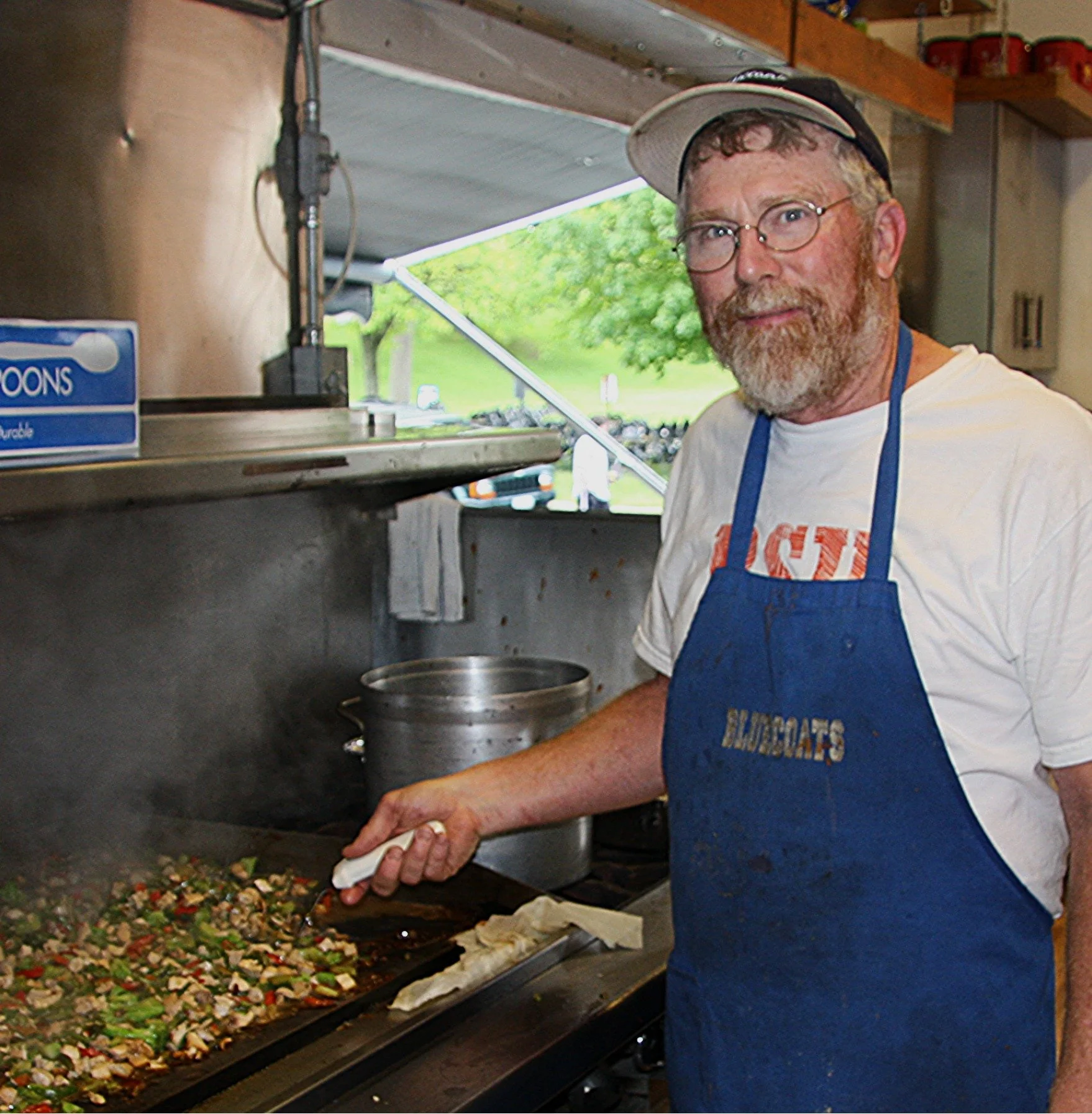 Photo of John Lowe on the Bluecoats food truck.