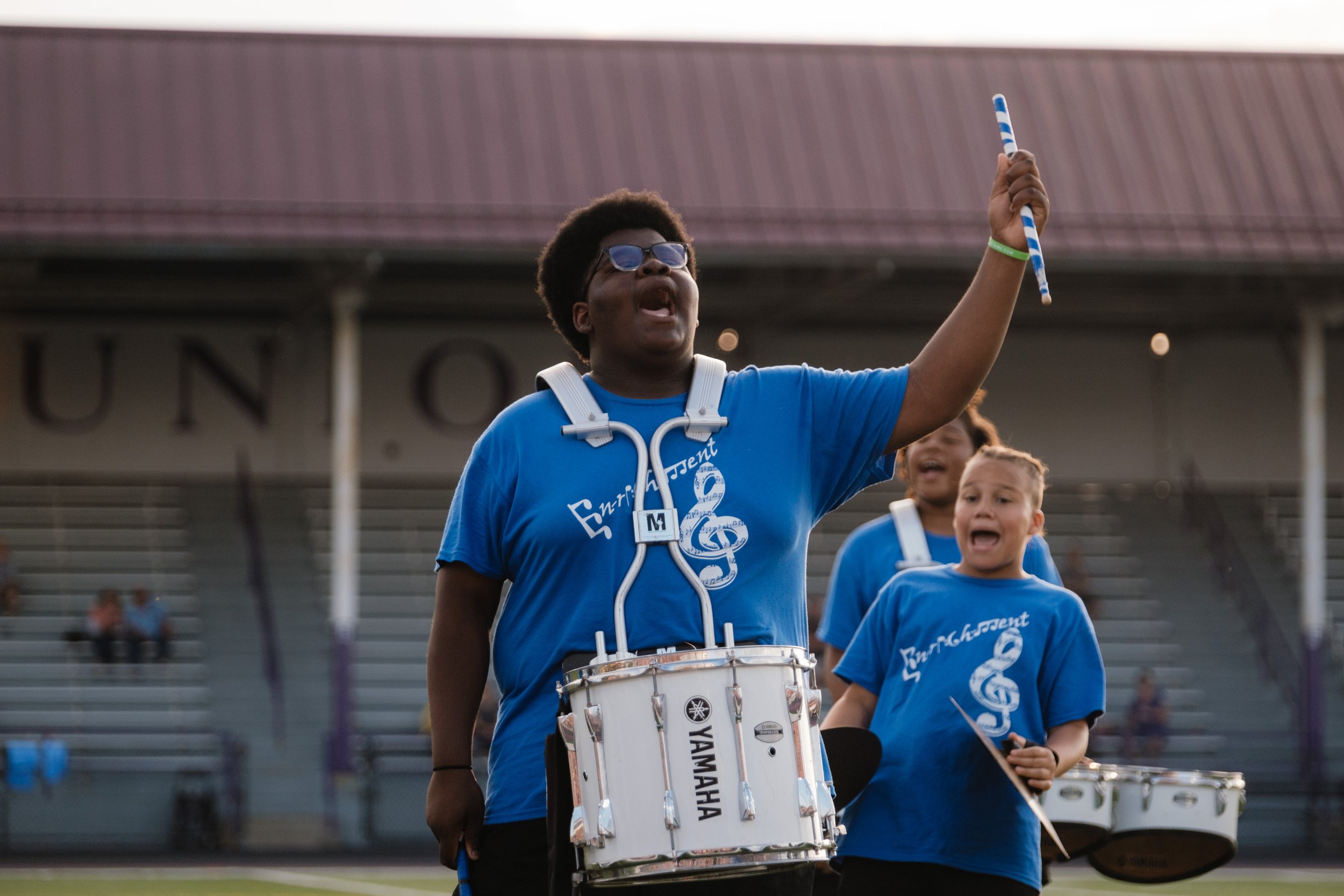 EN-RICH-MENT snare drummer performing at Bluecoats Opening Night.
