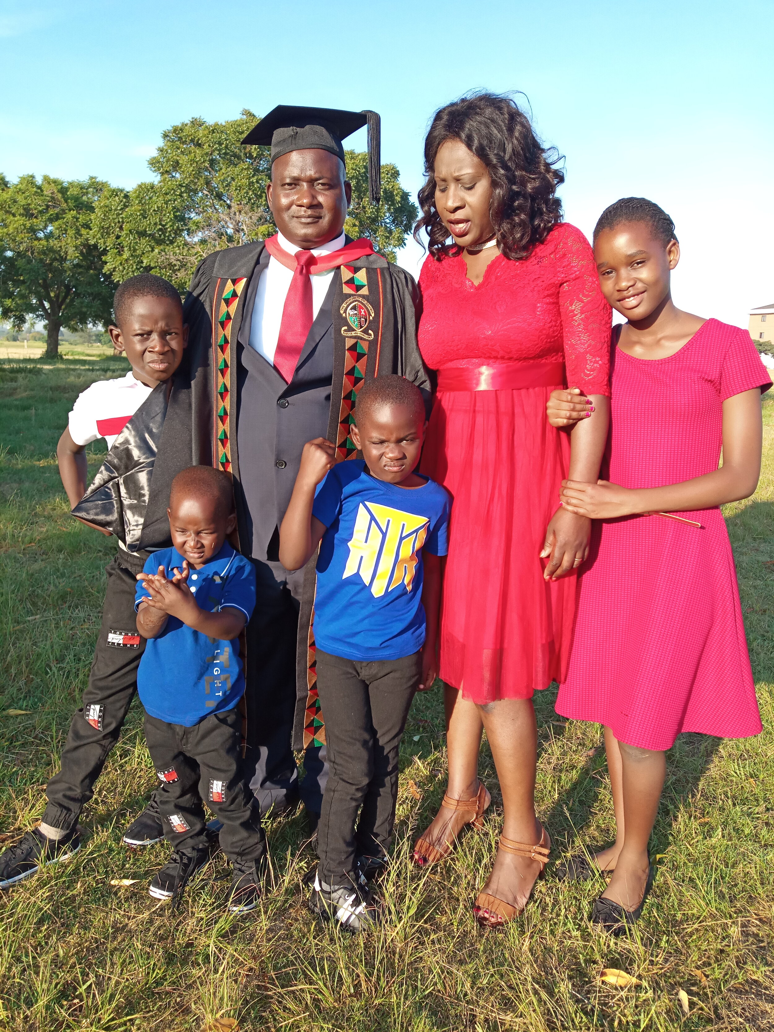  ..with wife Luta Kasongo, and children. 