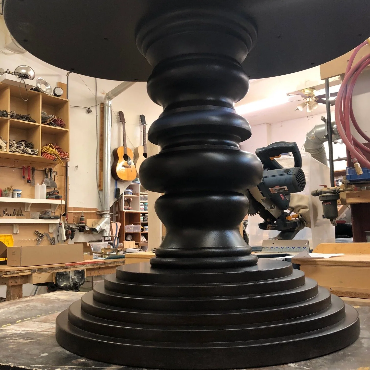 chunky pedestal dining table.jpeg