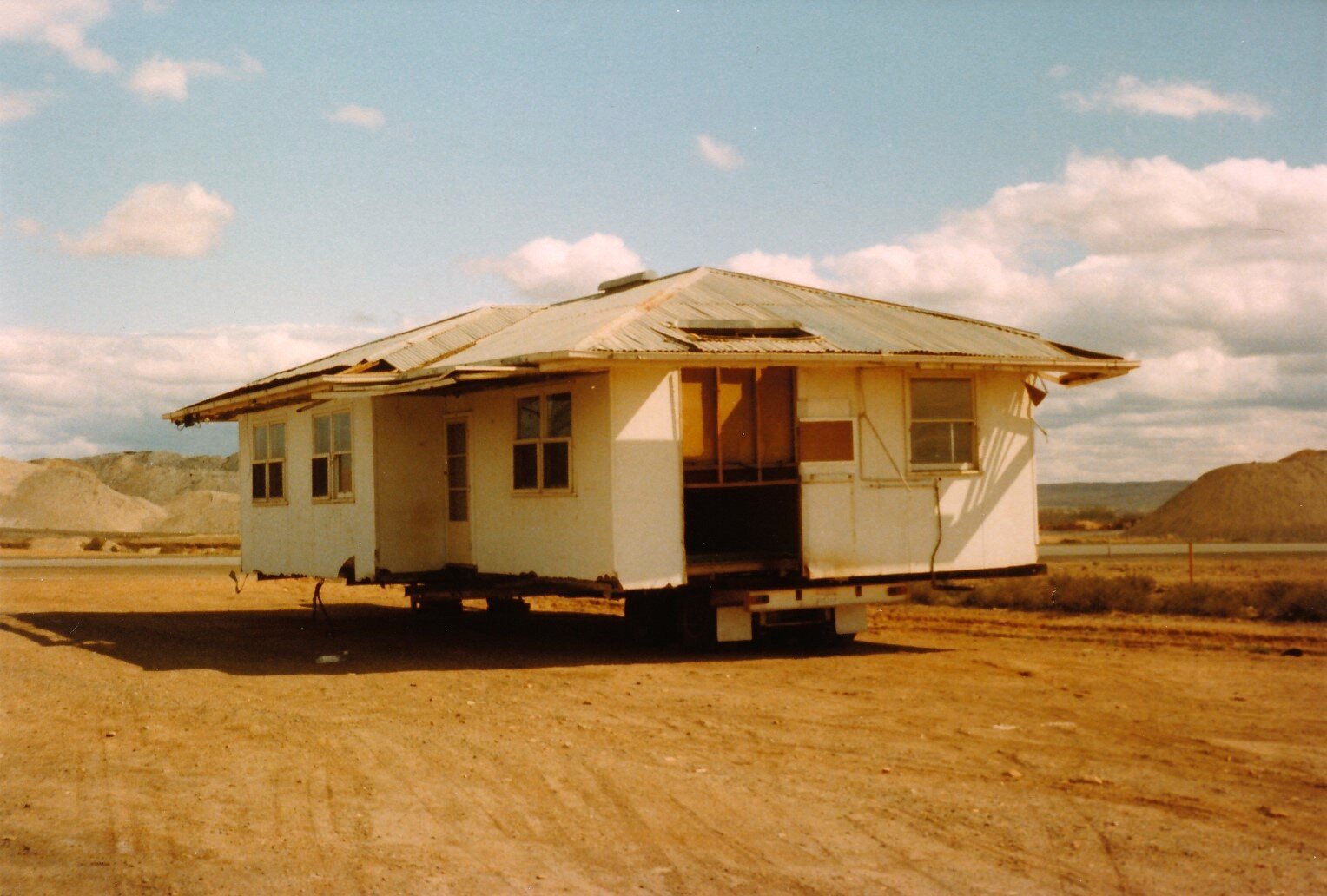  Destination unknown - September 1982 One of many transportable houses sold at auction ready for relocation to a new address. Enid Blieschke Collection 