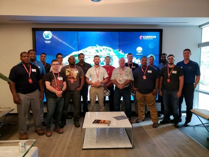 Above:Military Recruiting Team at Cameron, a Schlumberger Company, stands with a group of Military Hiring Event attendees. Of the 14 who attended this event, 12 were hired on the spot. Below: Want an exciting career post Military Service? Check out this video…