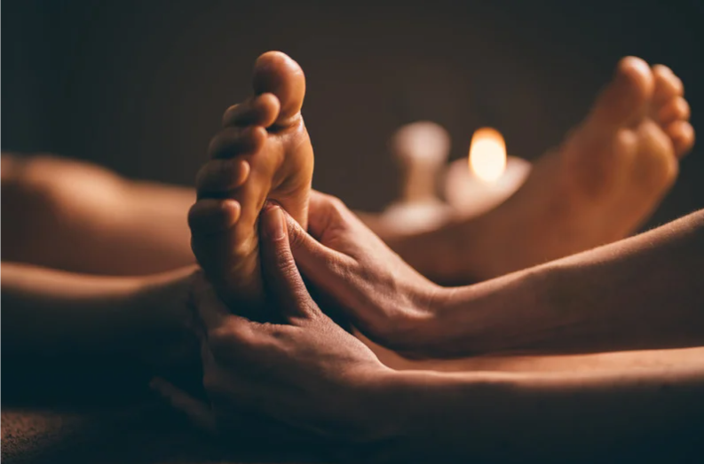 A foot being massaged at Skin RNI in Canmore