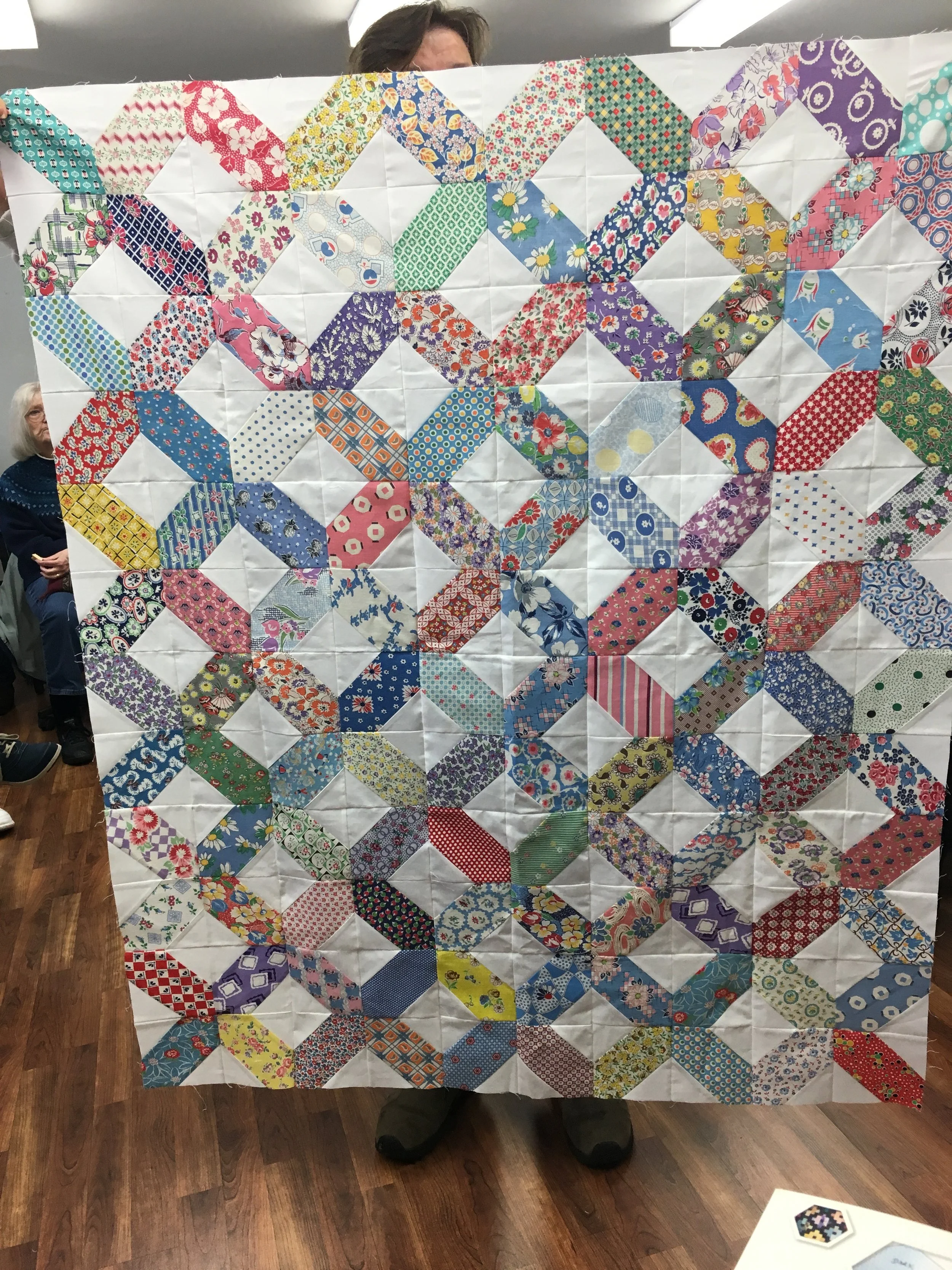 Connie always steals the show with her scrap quilts. A Feed sacks wonder.