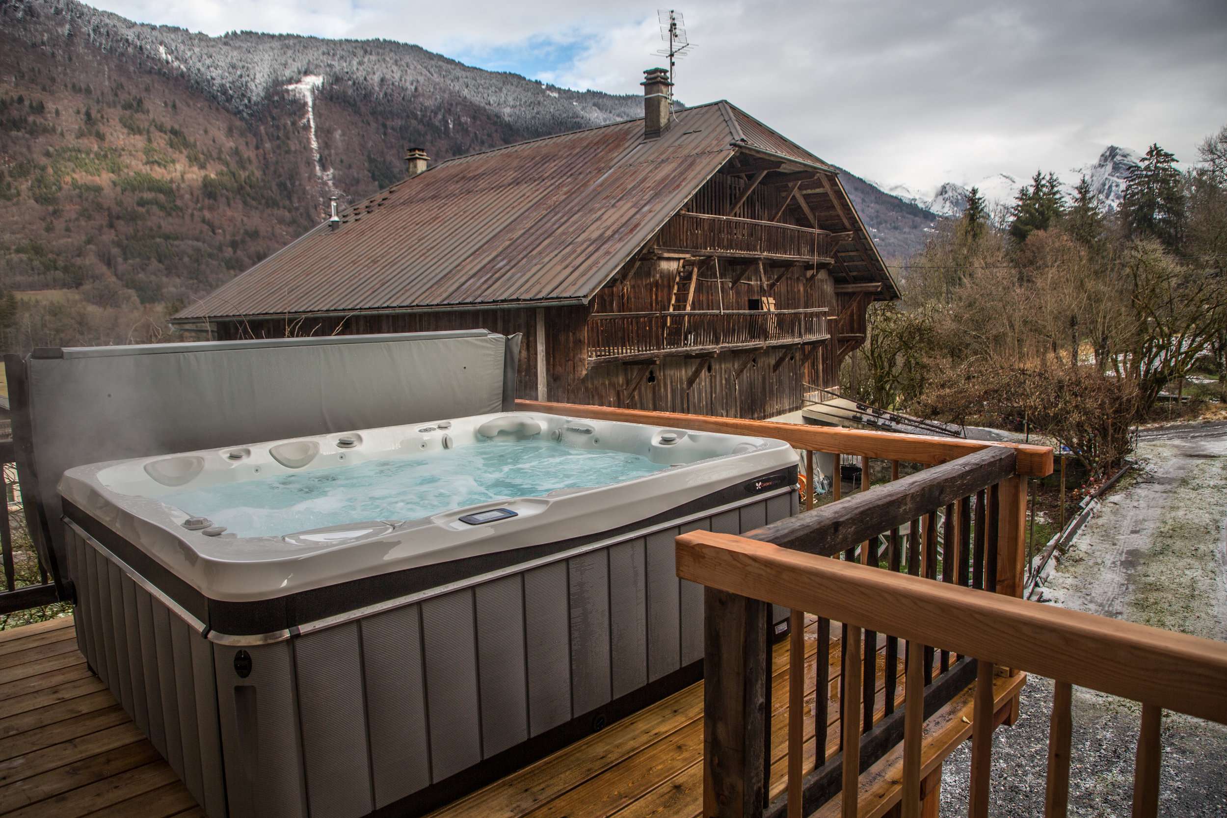 8-person Jacuzzi hot tub with mountain view