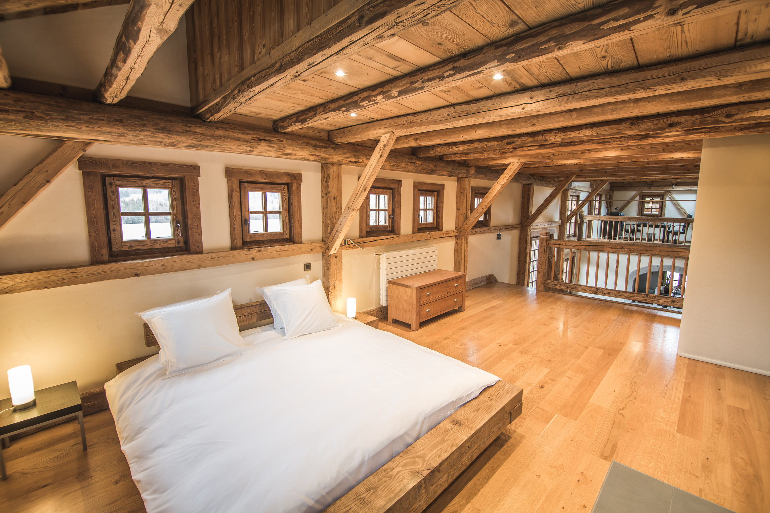 Bedroom #3 has view over Mezzanine to second level and Living Room below