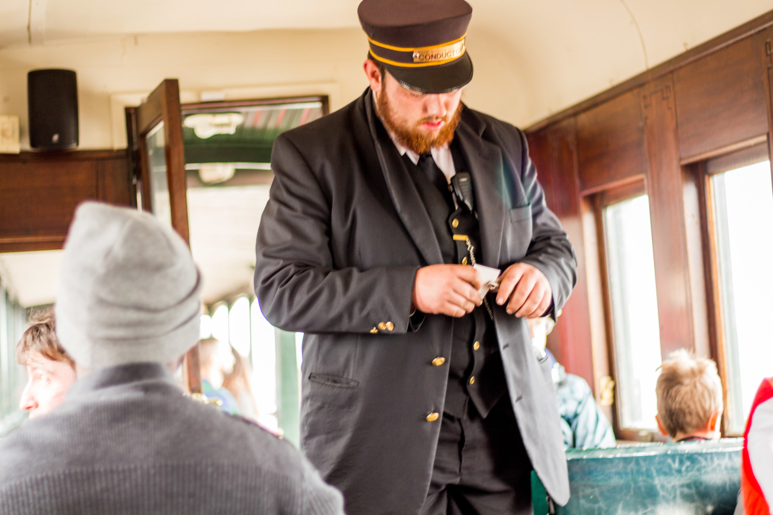  Passengers and Volunteers take the last ride of the 2017 season on the Maine Narrow Gauge Railroad’s train in Portland, Maine on October 29, 2017. 