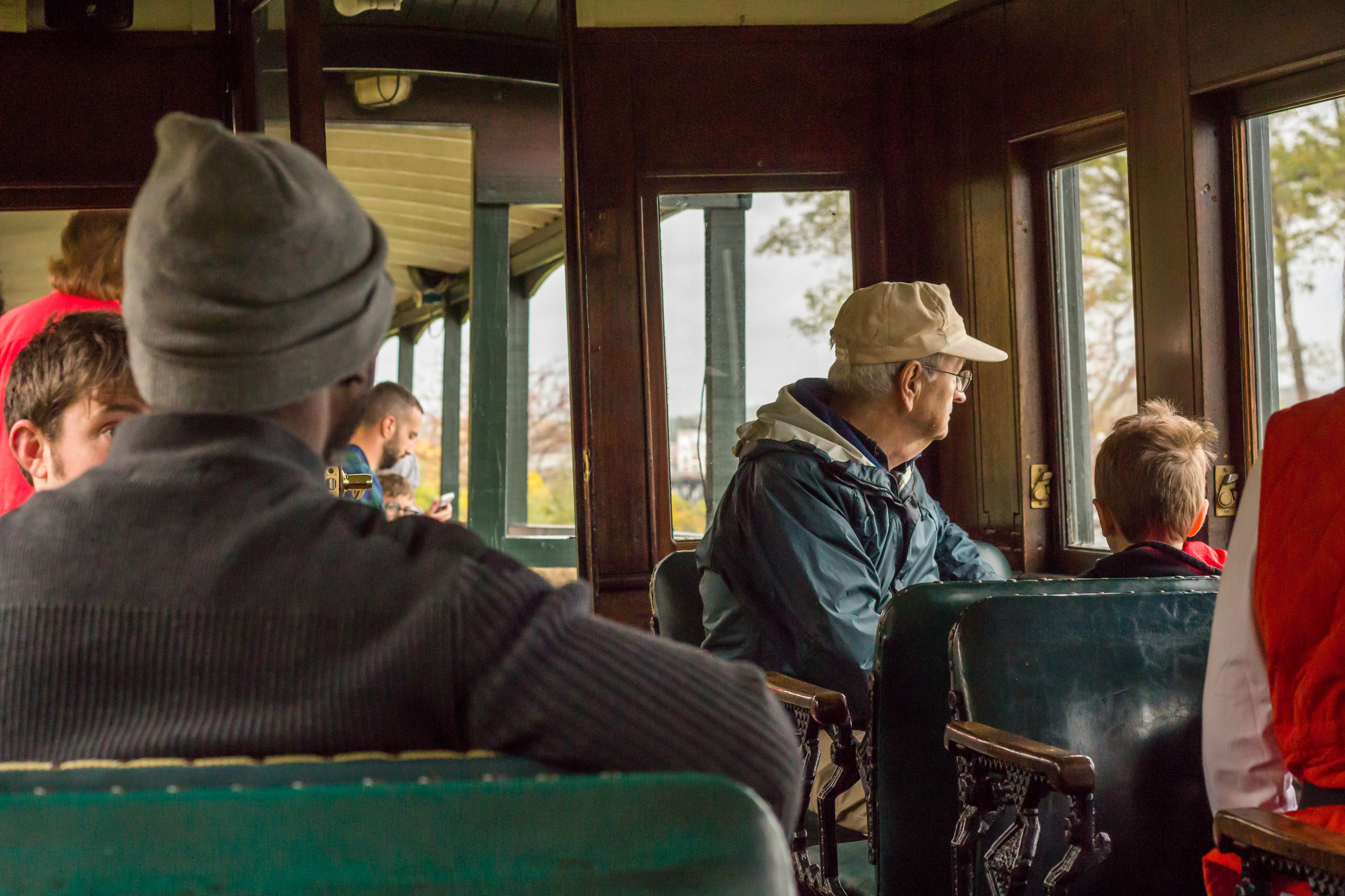  Passengers and Volunteers take the last ride of the 2017 season on the Maine Narrow Gauge Railroad’s train in Portland, Maine on October 29, 2017. 