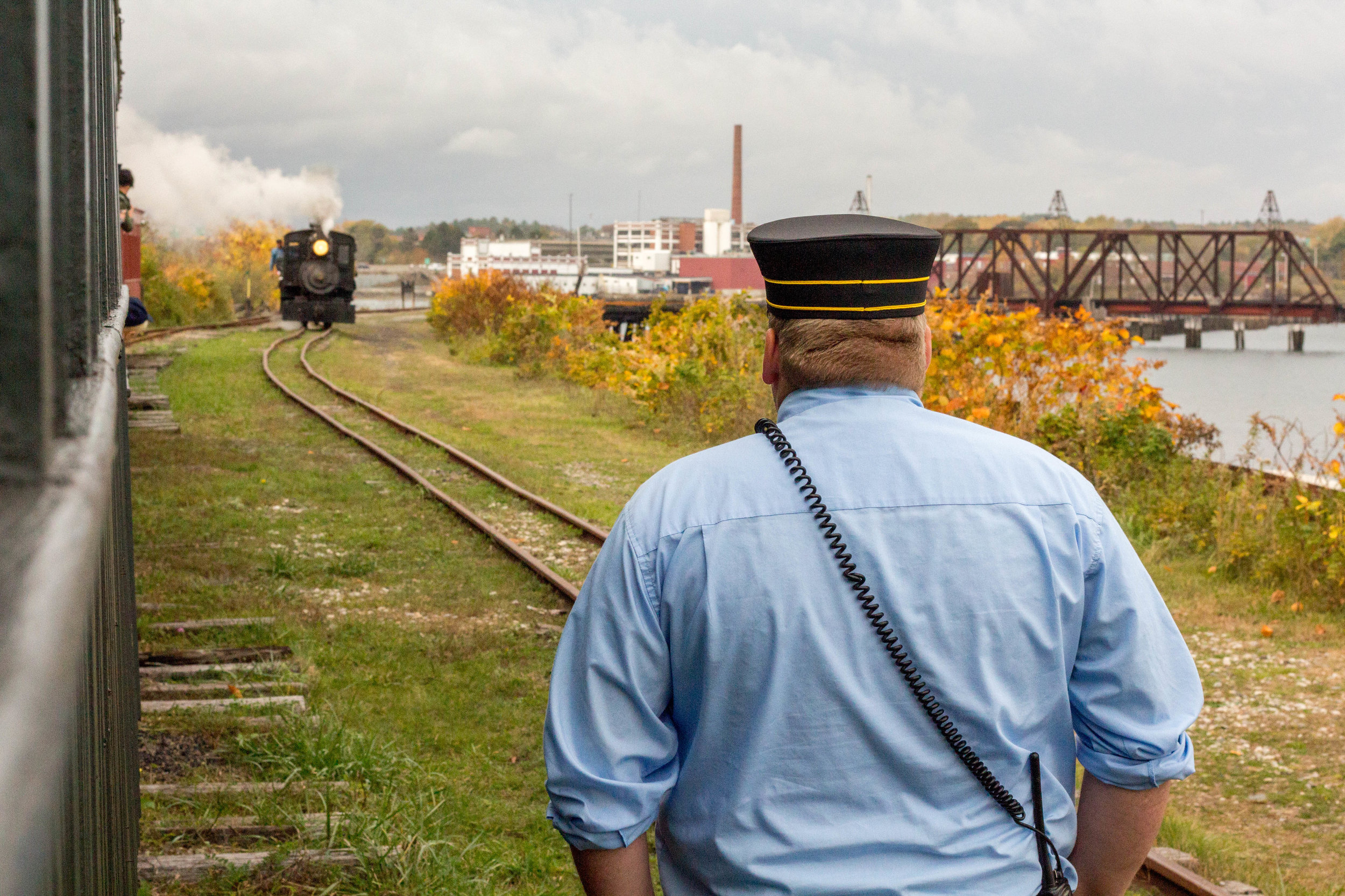  Passengers and Volunteers take the last ride of the 2017 season on the Maine Narrow Gauge Railroad’s train in Portland, Maine on October 29, 2017. 