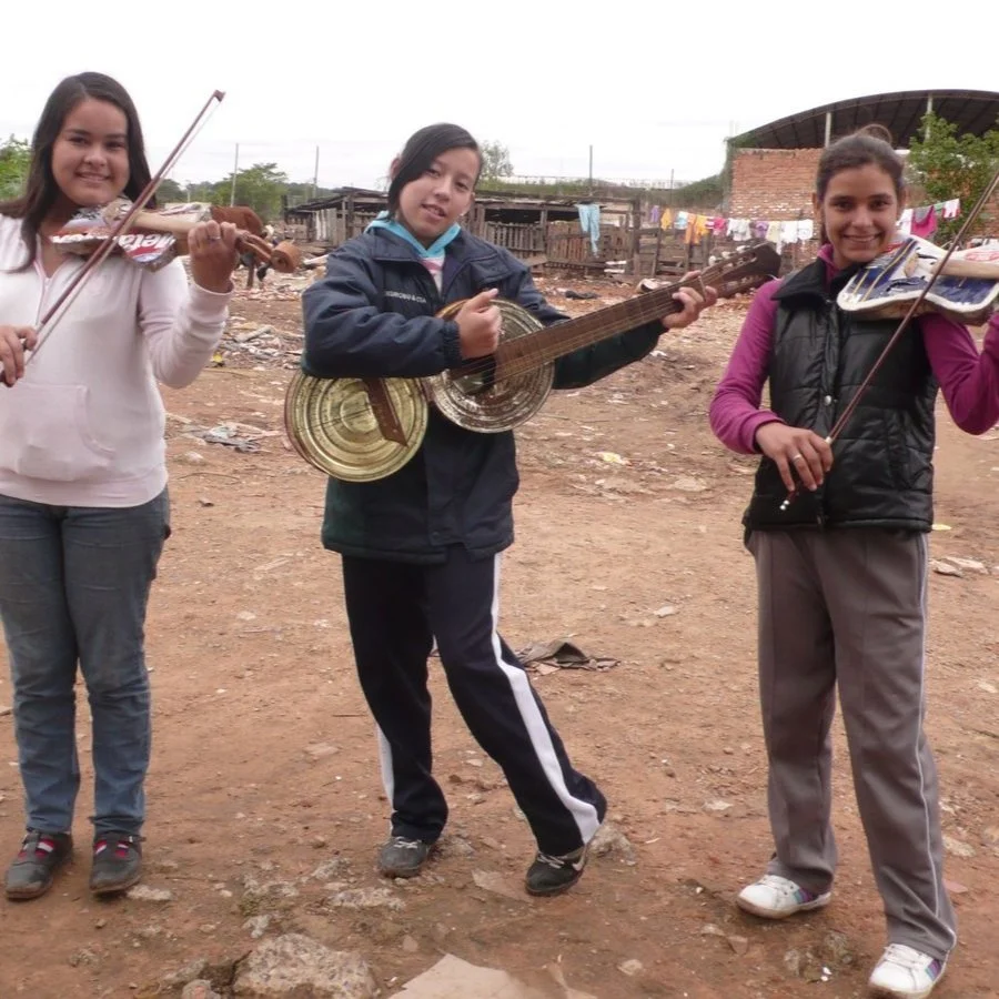Play String Instruments Made from Recycled Materials