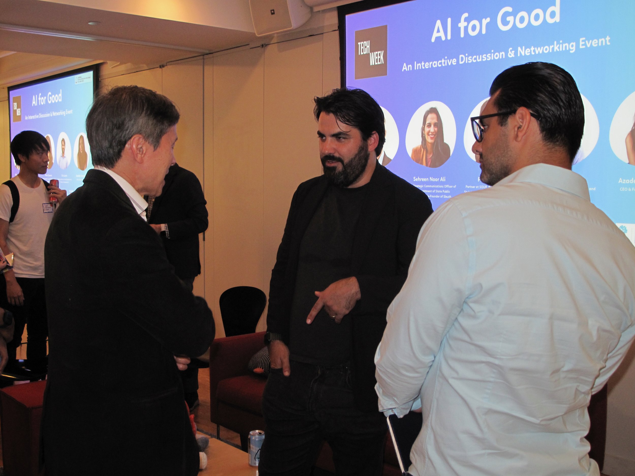 Final candid Doug, Eric guest with notebook.jpeg