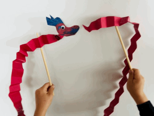 creative-prompts_celebrate-lunar-new-year-with-dragon-dancing_dragon-dancing-lunar-new-year-bySven.gif