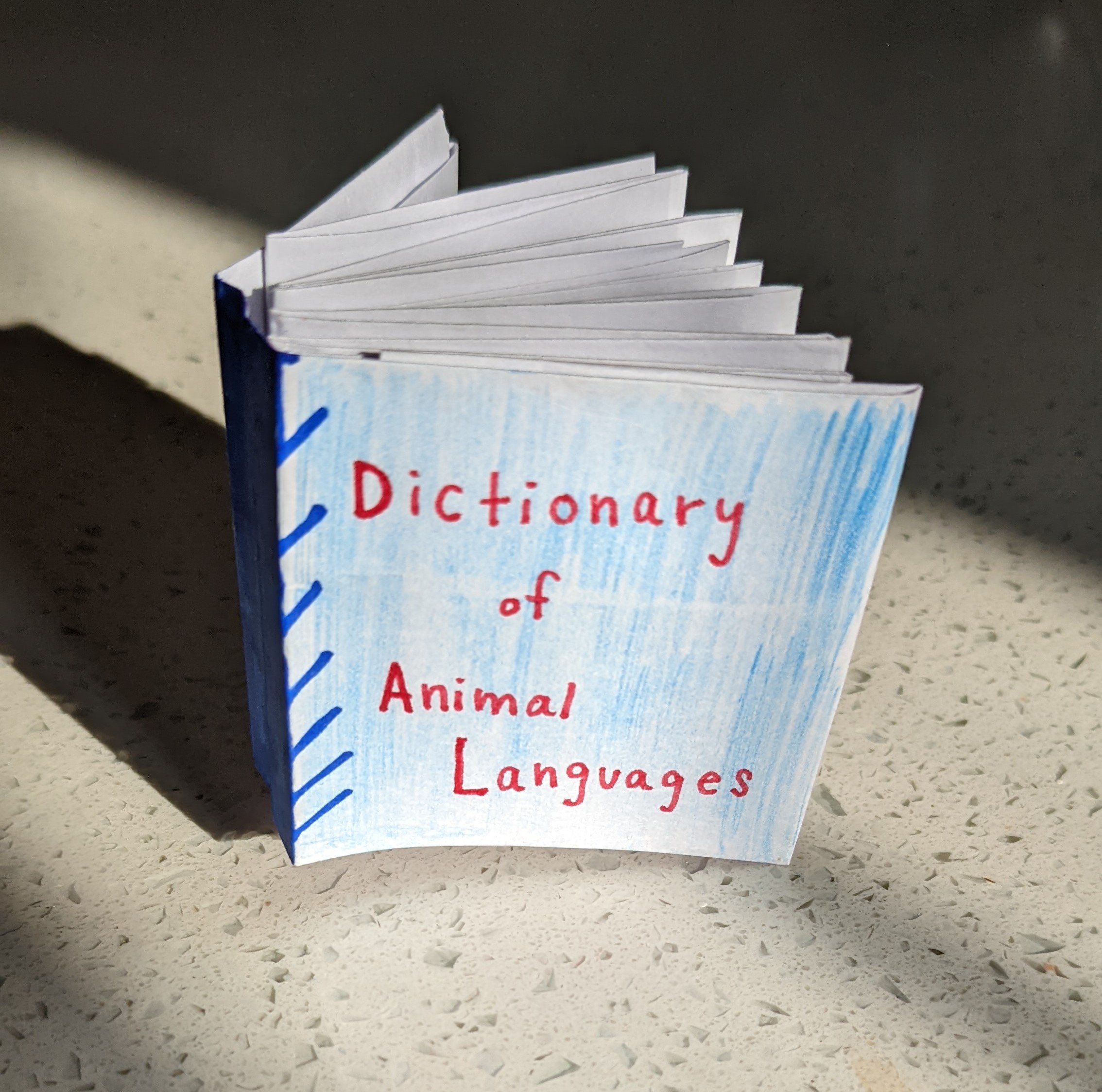 creative-prompts_write-a-dictionary-of-animal-languages_dictionary-book-byRebecca.jpg