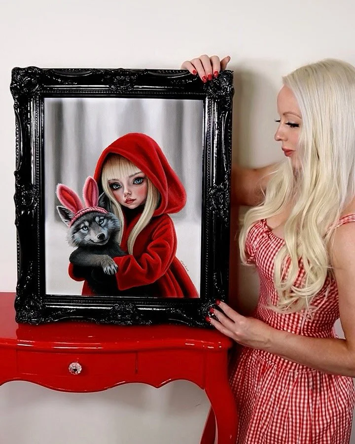 Thank you to @poetictigergallery for the opportunity to have my painting in the past show, Grimm Allegory. 🖤🐺💃❤️For my twist on this fairy tale, it was important to me to capture the haunting eyes of Little Red and her newly found forest bunny. Th