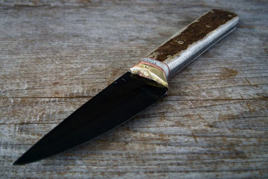 Different styles of custom steak knives. Materials that have been recovered and repurposed. Cutlery with spirit.