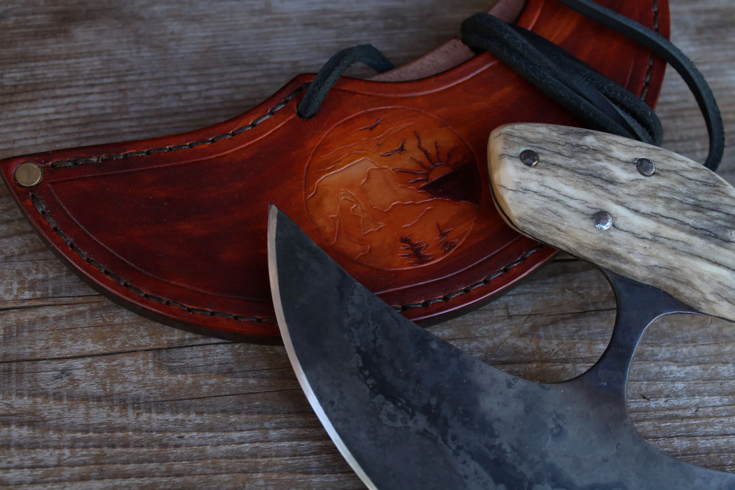 custom art, tooled leather. Ulu