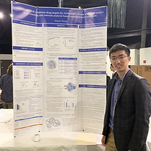 Daniel Zhang with Poster