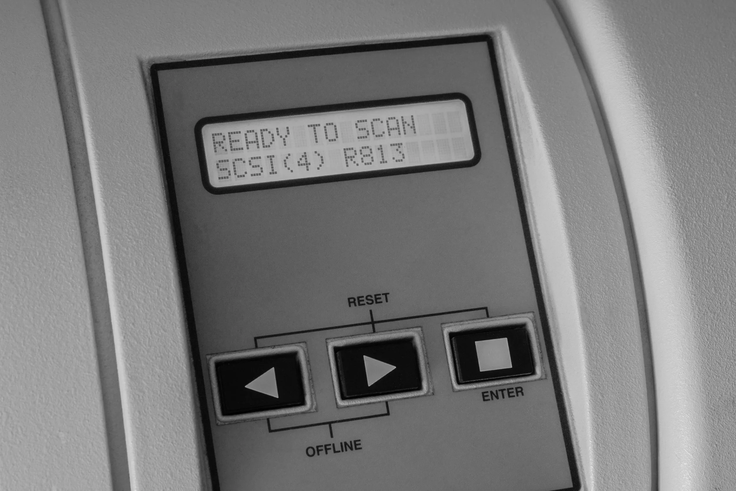 Electronic device screen displaying the message 'READY TO SCAN' with options for scanning settings and buttons below.