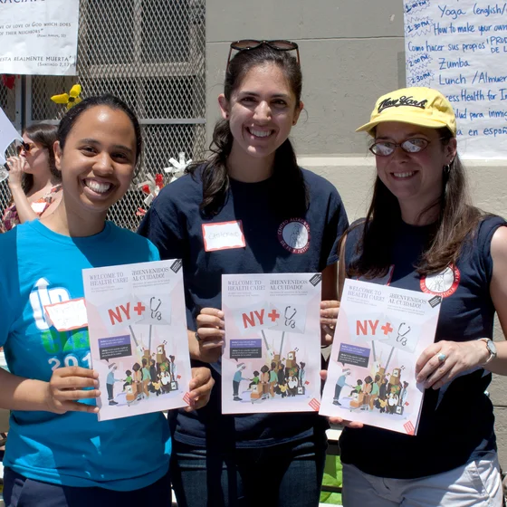 People-holding-pamphlets.jpg