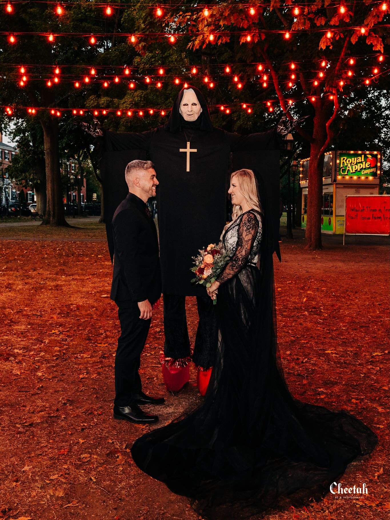 A little romance under the lights in Salem🖤

#SalemMA #WitchyVibes #HalloweenWedding #MoodyPortraits #cheetahdjphotography
