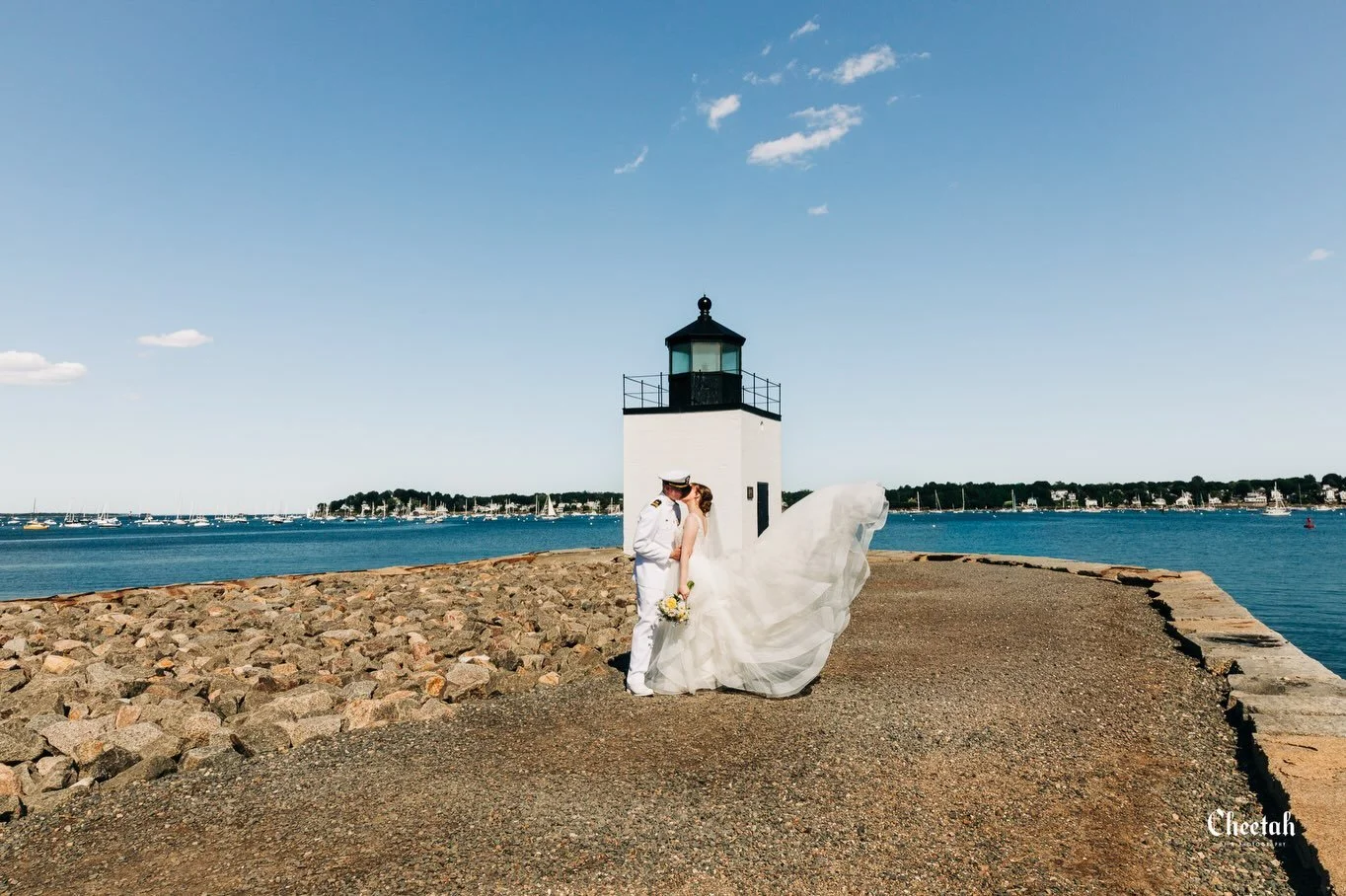 A little wind&hellip; and a whole lot of magic. 🤍🌊

After exchanging their vows at The Immaculate Conception Church in Salem, we made our way to the lighthouse for portraits. One perfectly timed moment brought her gown to life, creating a memory th
