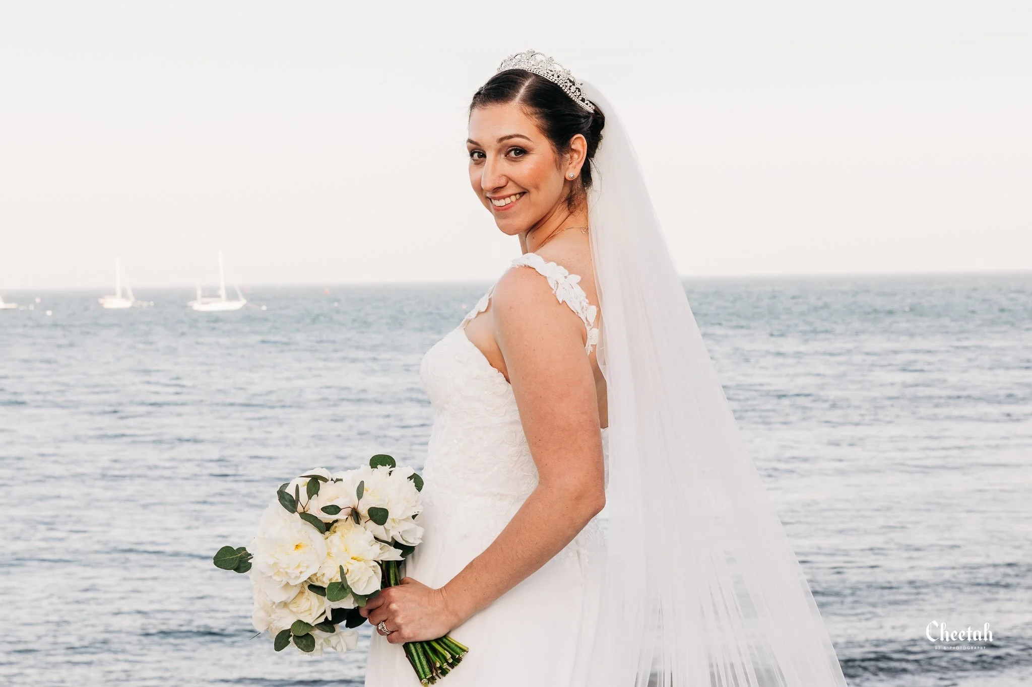 Some moments don&rsquo;t need elaborate words.

Just a beautiful bride, the ocean behind her, and the beginning of forever. 🤍🌊

#MassachusettsWedding #BostonWeddingPhotographer #BridePortrait #NewEnglandWedding #CheetahDJPhotography