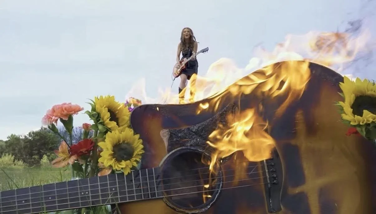 ASIAN AMERICAN COUNTRY ARTIST BELLA LAM’S “TAKE IT OUT ON MY GUITAR” VIDEO ADDED TO THE HEARTLAND NETWORK