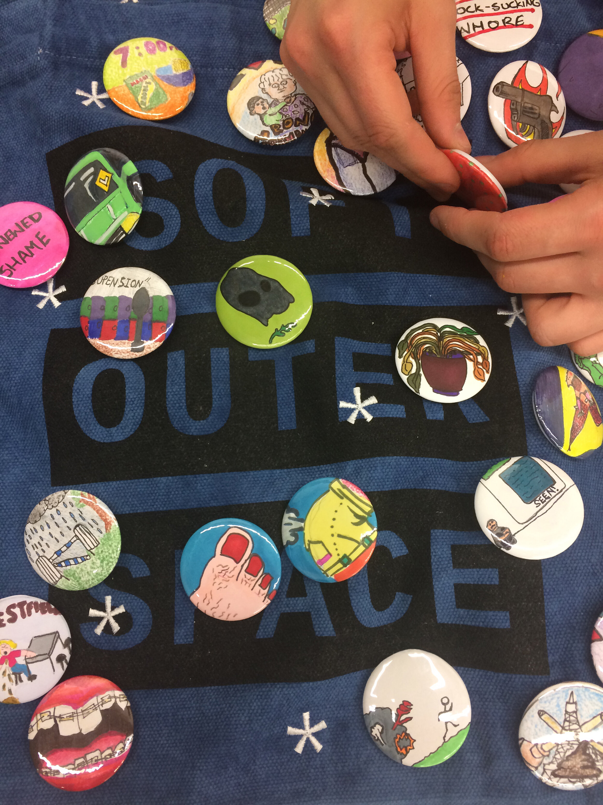  Personalised Badge-making Workshops, hosted at Outer Space Artist Run Initiative, 2018 - 2019.  Badges by Kat Campbell, Janni Cox, Rhiannon Dionysius, Amelia Hine, Peter Kozak, Naomi O’Reilly, Marc du Potiers and Caity Reynolds. 