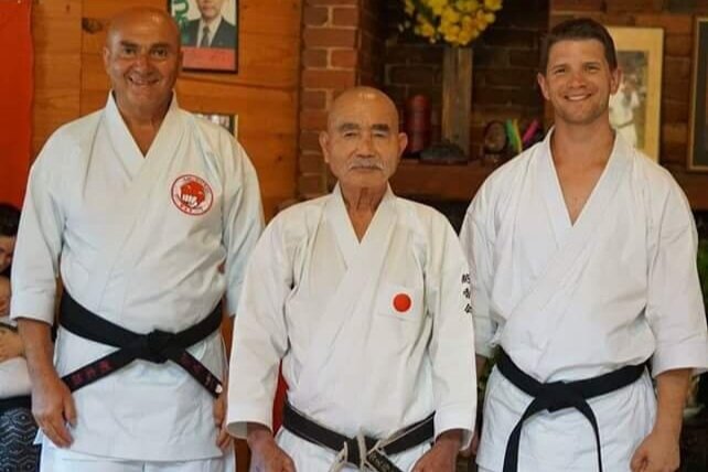 James Sumarac, sensei Noguchi Michiro and Peter Zarb standing in the Wu Lin dojo