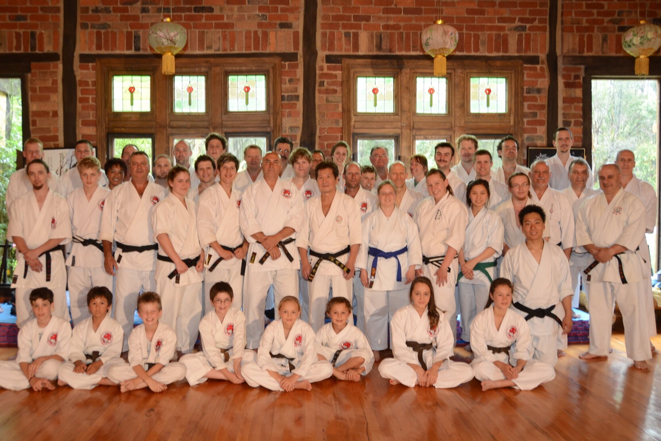 Karate friends catch up every year to train and share experiences, and take group photos