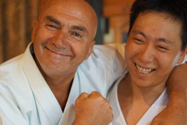 Karate expert James Sumarac laughing with Matthew Tan