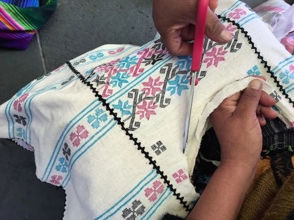 cutting_out_the_neckline_of_the_turq_pink_fd92a7b4-90d3-4a47-a82a-4b8ef96c296a.jpg