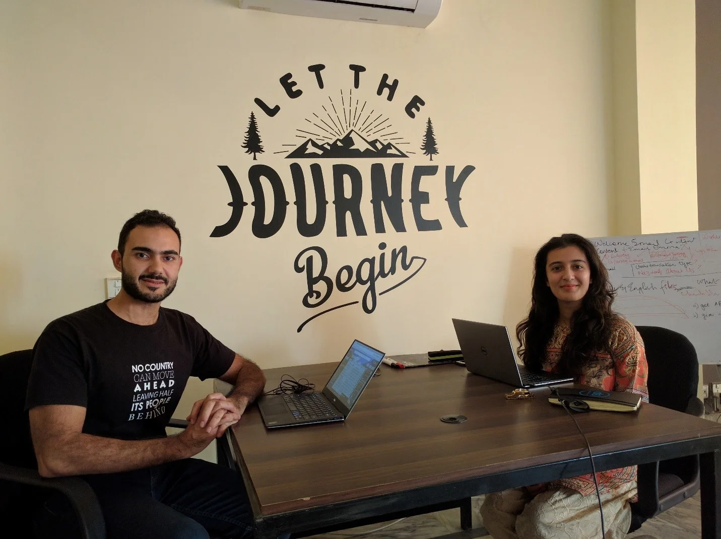 “Working from Kickstart, a co-working space in Lahore. It was only befitting to sit in front of a wall that said, ‘Let the Journey Begin’.” -Madiha Nasrullah