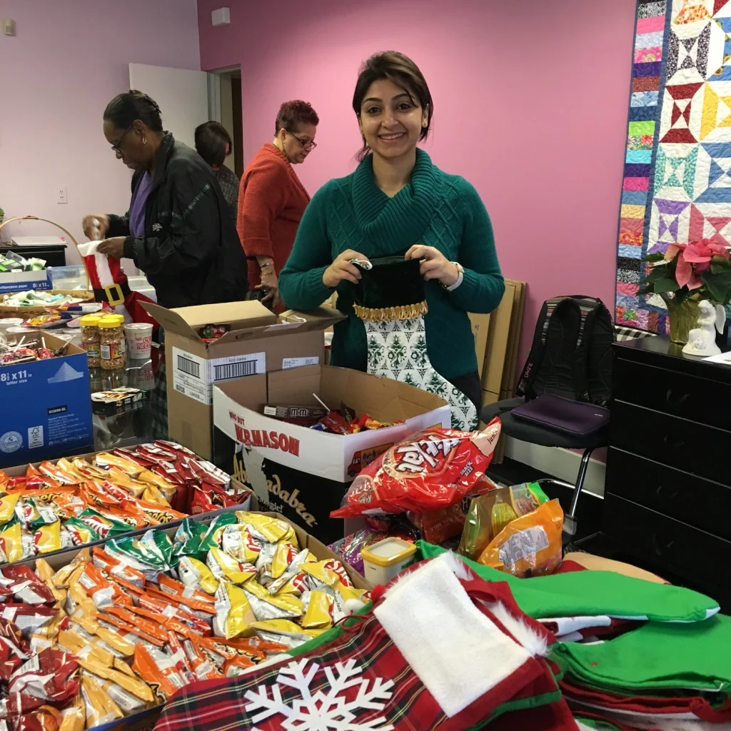 Packing Christmas gifts at Angels of Mercy.