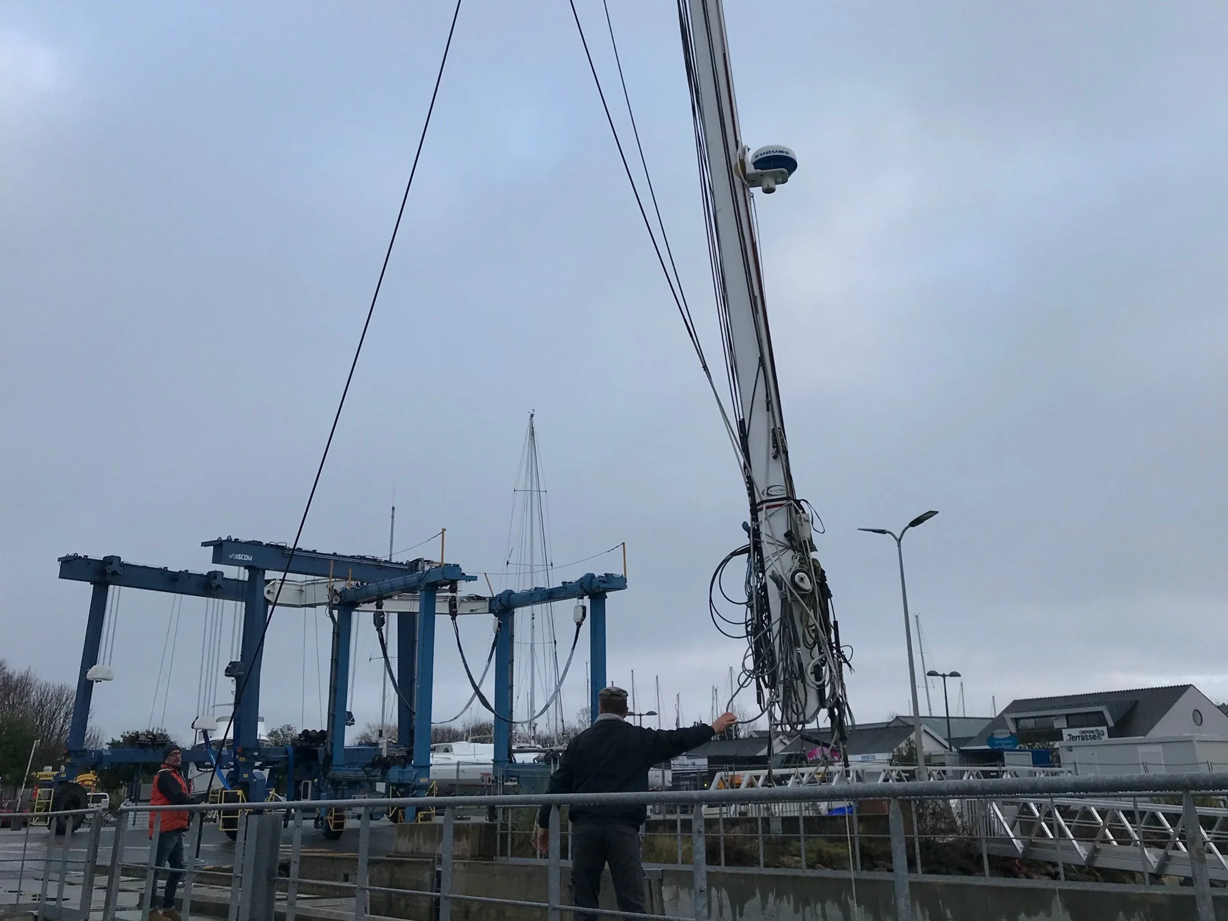 Our mast was removed to be surveyed this week - it's an annual requirement when racing in the IMOCA class. The survey is an ultrasound to check for weakness's or voids flaws in the carbon structure. We passed with flying colours!