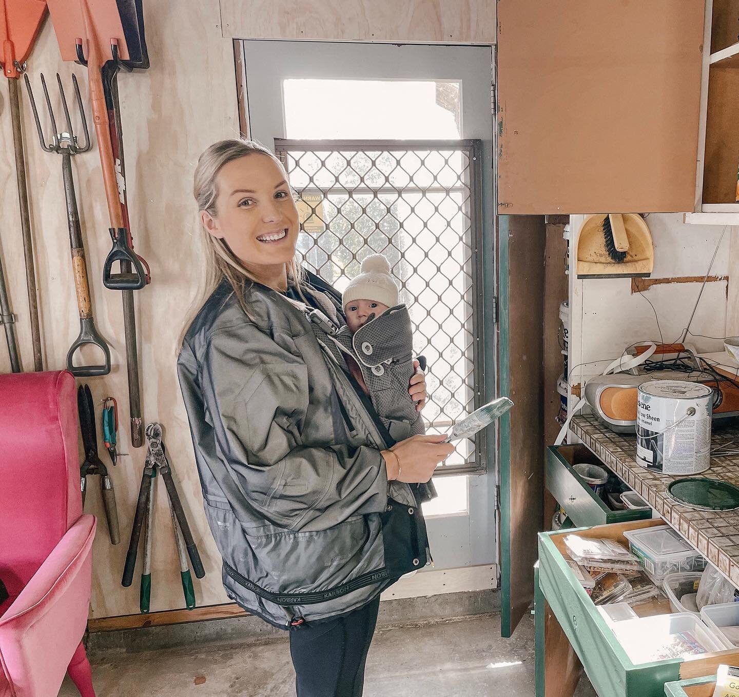 My little work buddy helping paint the garage cupboards GREEN 😝 The perfect rainy Sunday job 〰️ PS spot the pink chair we&rsquo;re about to recover!