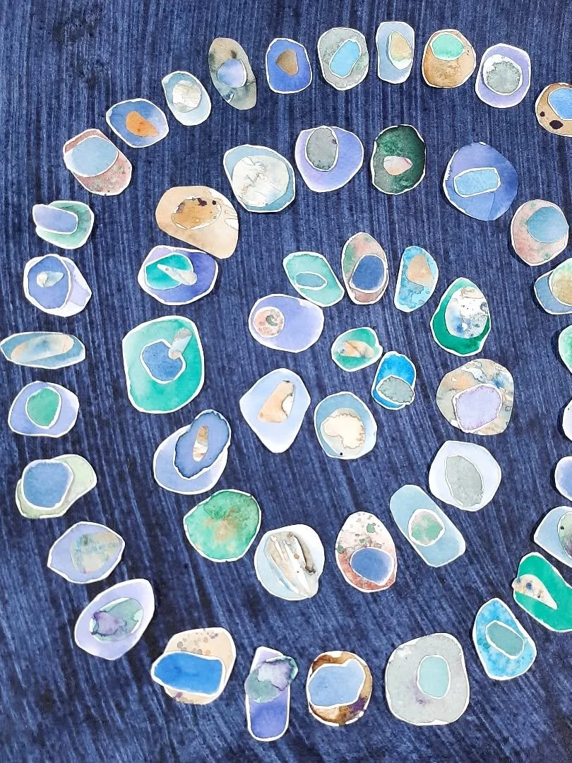 Isn't this heavenly? Seaglass spiral inspired by recent trips to #Seaham #CountyDurham 
I had already painted and cut all the pebbles and was able to arrange and glue them down while at @craftsinthepen this weekend. 
I like having pieces like this to