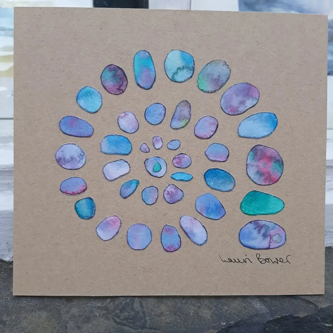 This lovely pebble spiral is also wrapped and available to buy at #WetherbyGallery 
Each pebble is cut from watercolour painted paper and edged with a line of Inktense watercolour pencil. 
I completed it during my recent #PaperCollage workshop. 
If y