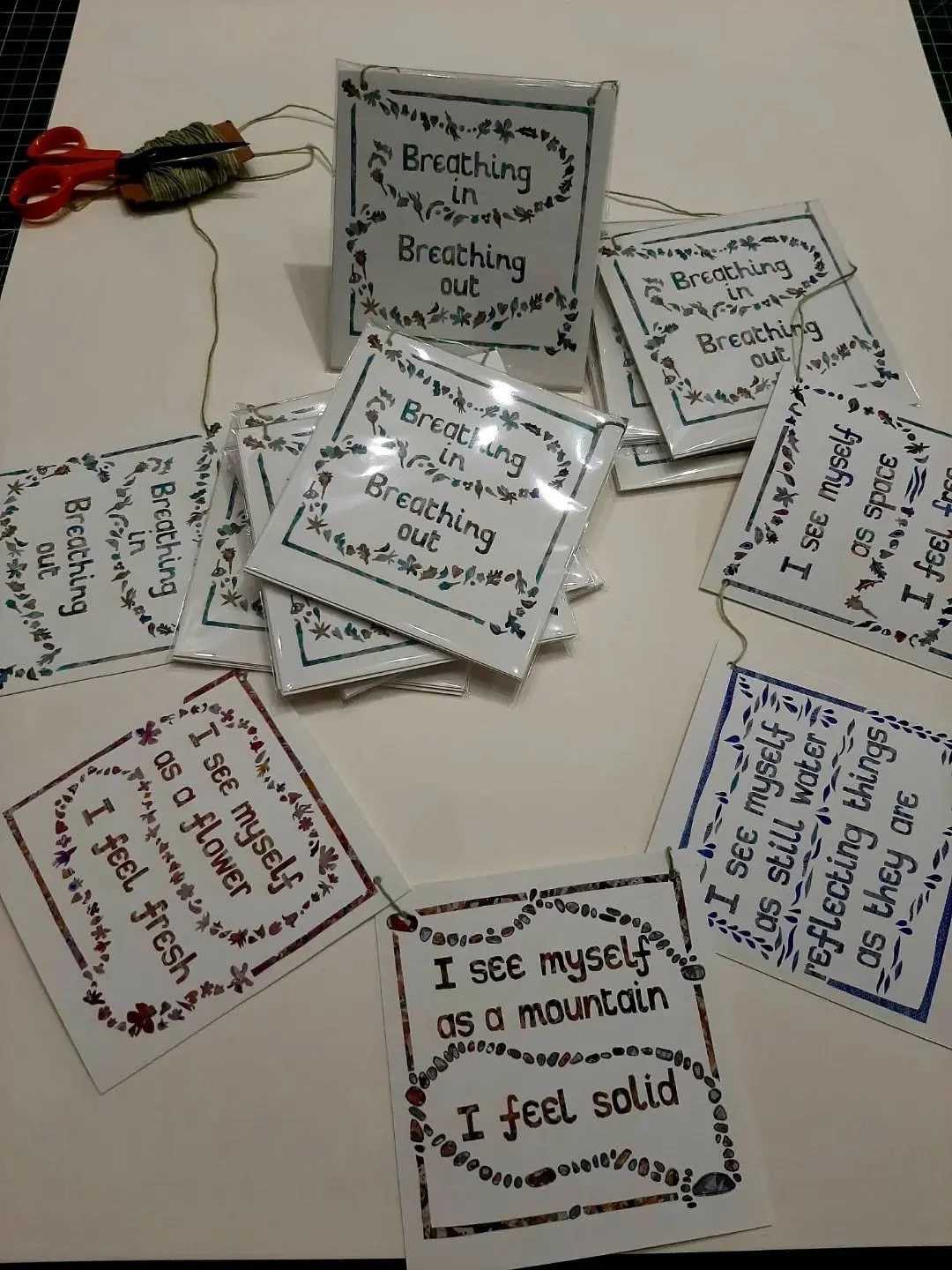 I've been putting together more bunting today. 
It features the words of the beautiful guided meditation 
🍃 Breathing in, breathing out 
🍃 I see myself as a flower, I feel fresh 
🍃 I see myself as a mountain, I feel solid 
🍃 I see myself as still