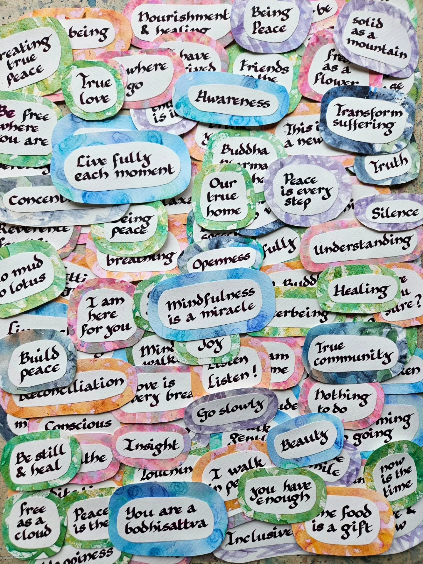 100 #Mindfulness quotes from #ThichNhatHanh to celebrate his 100th birth anniversary on Sunday. 
Lauri will be at @beingpeaceuk this weekend co-leading #TheArtOfZen course and holding a mindful celebration in the evening, for which these paper pebble
