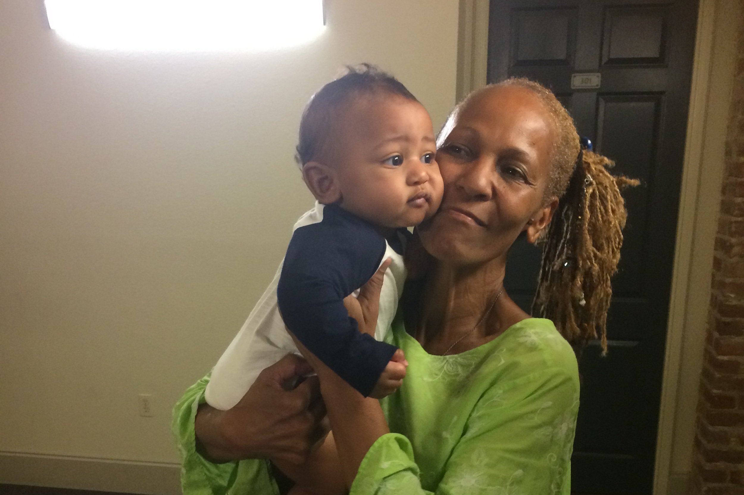 Owner and Birth Companion, Menhati with infant, Nasir, 2017