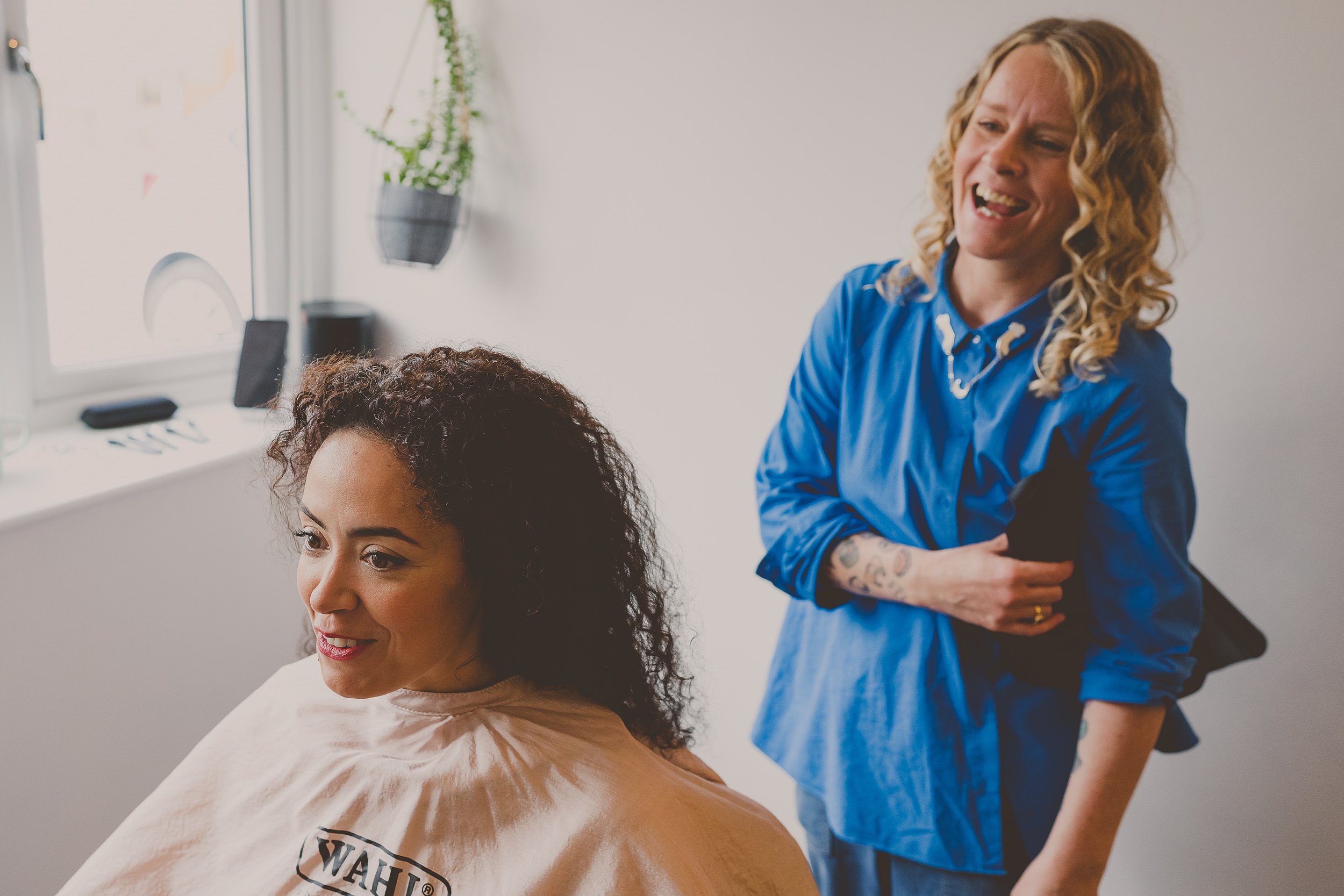 Lindsey with a client in her Rugeley curly hair studio