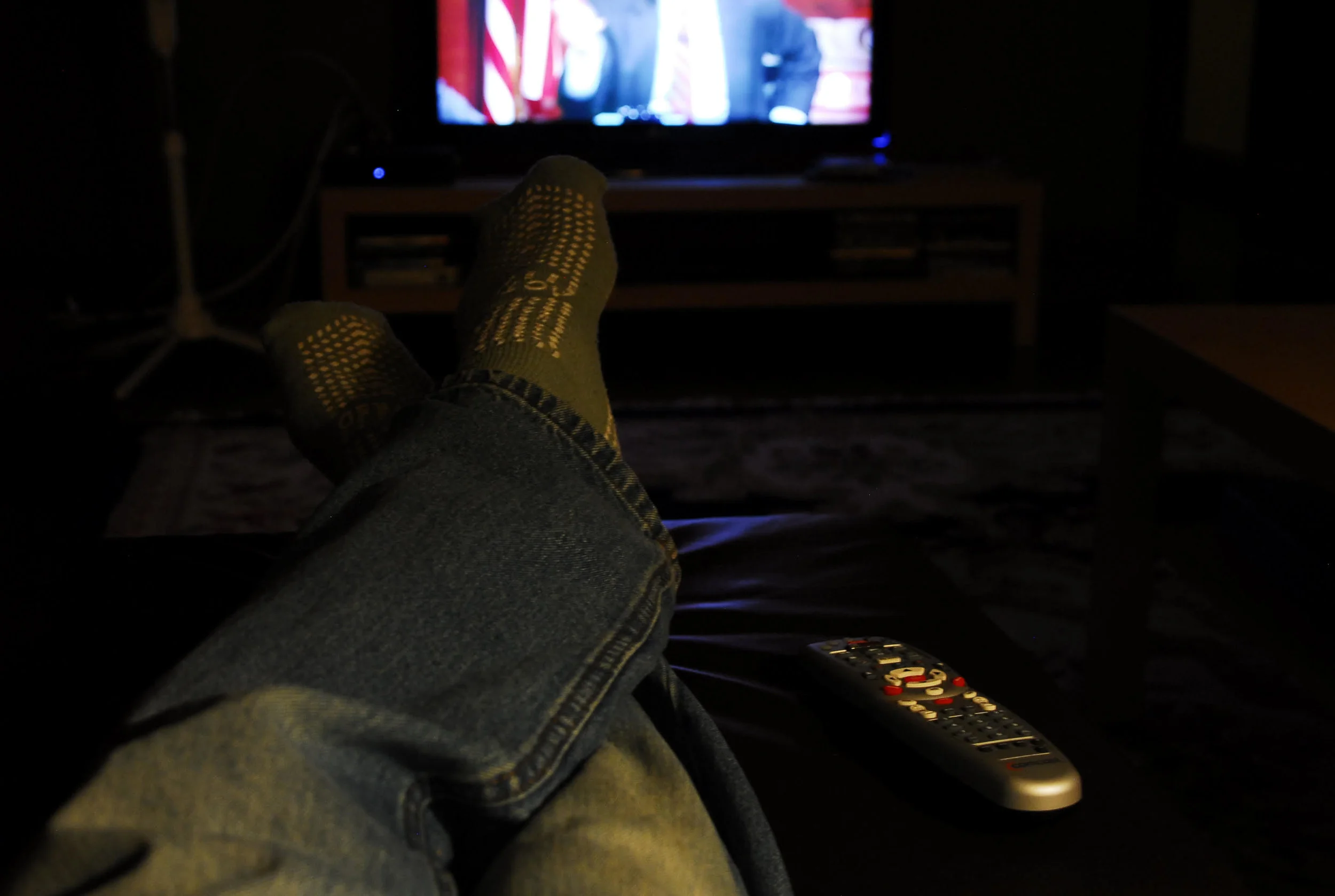 Buck’s feet resting in front of the TV