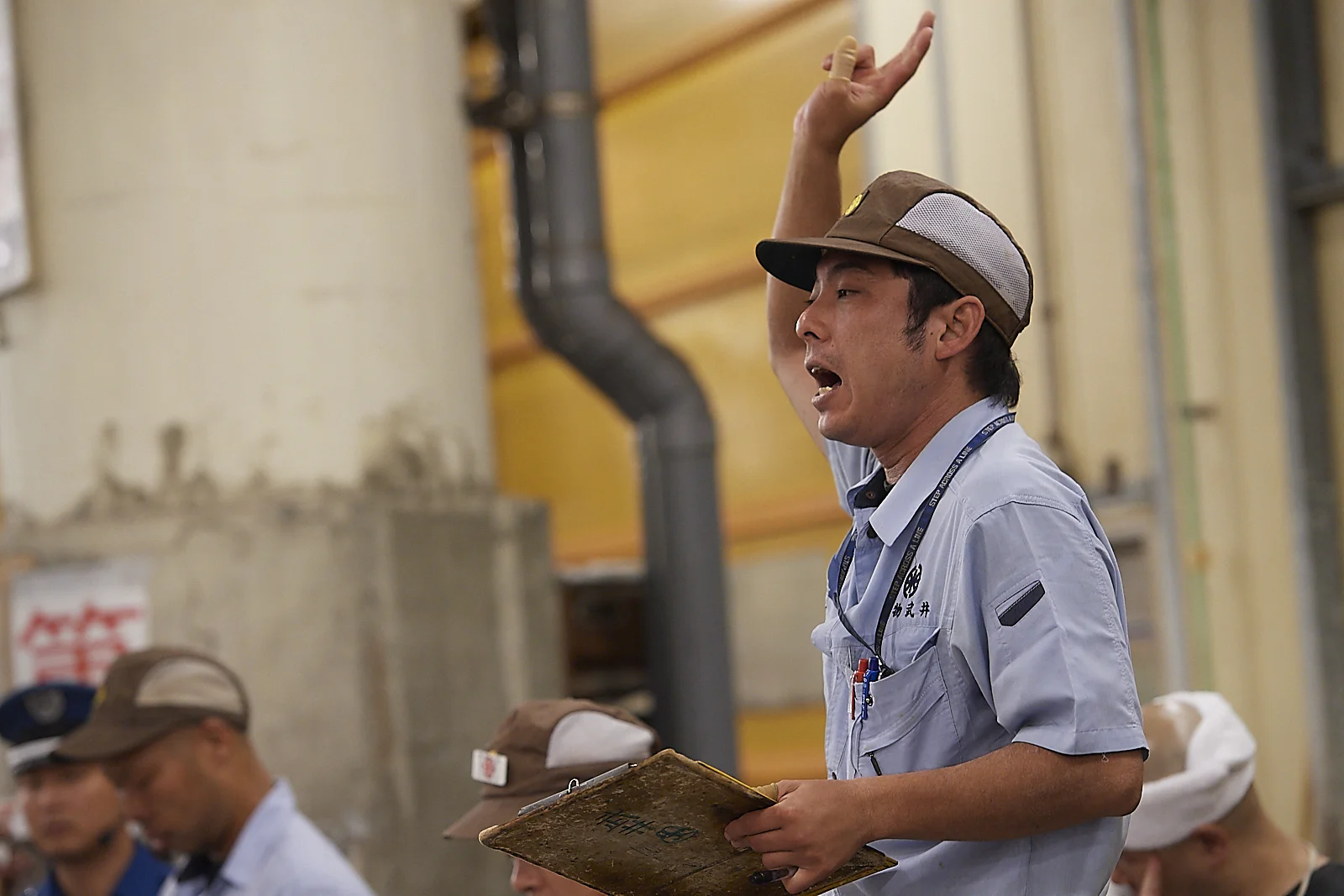 the auctioneers run the auction in a speed very difficult to follow, communicating with the buyers AND sellers with tiny, almost imperceptible, gestures (as opposed to shouts). the auction is finished in less than 2’