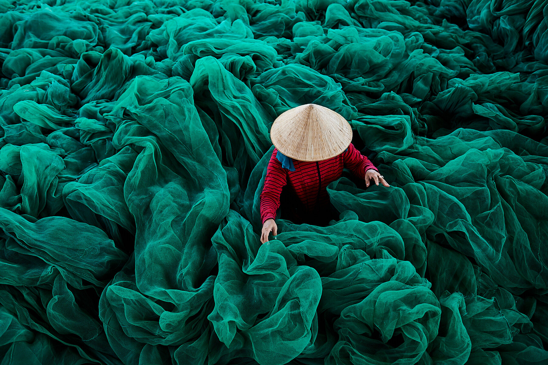 Net repair woman, Danang, Vietnam