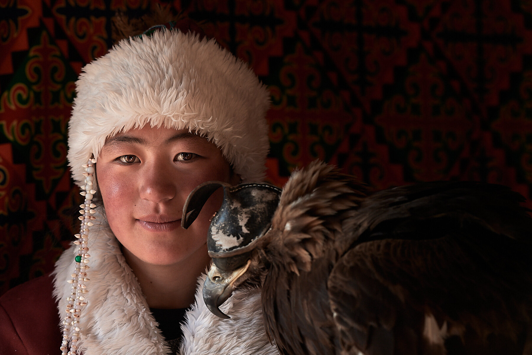Aigerim, one of the few eagle huntresses, Altai mountains