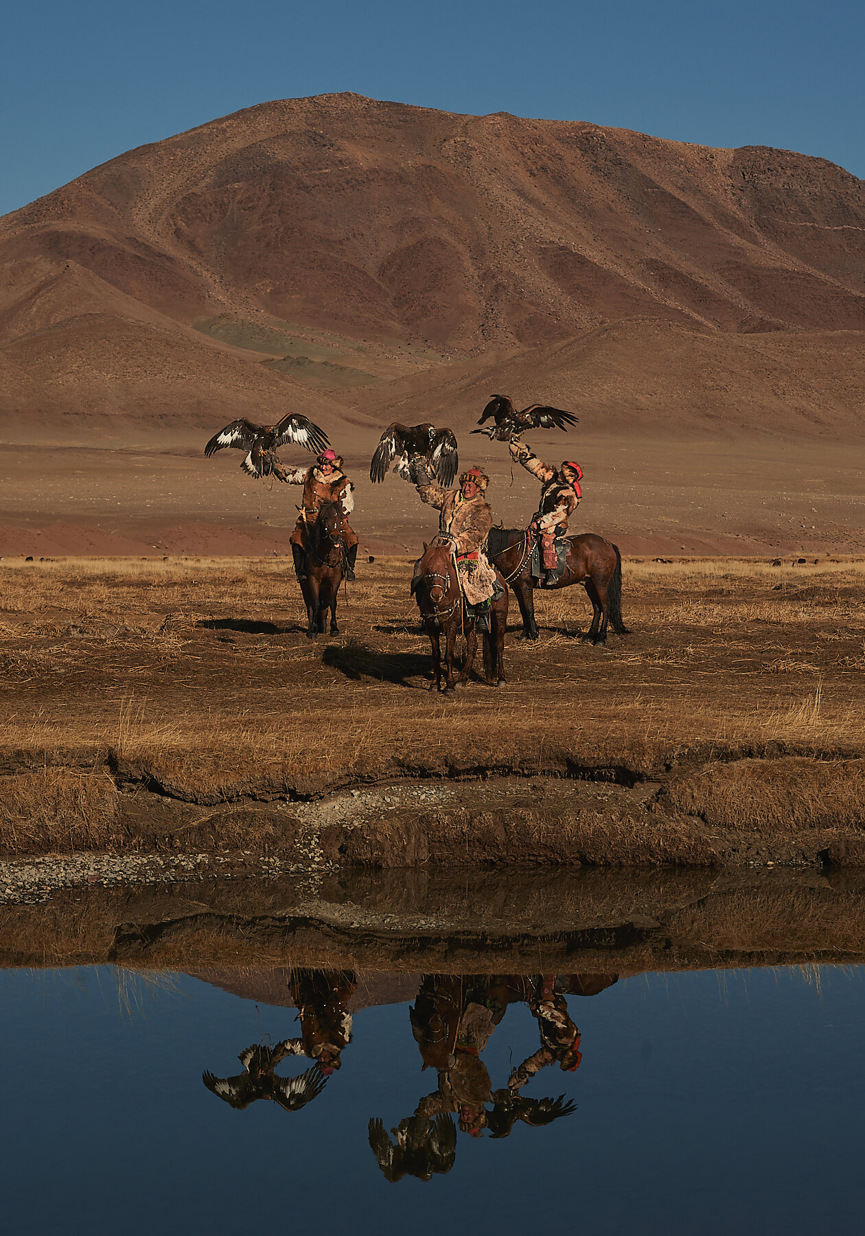Bashakhan, Tileyjan and Karibek, Kazakh eagle hunters