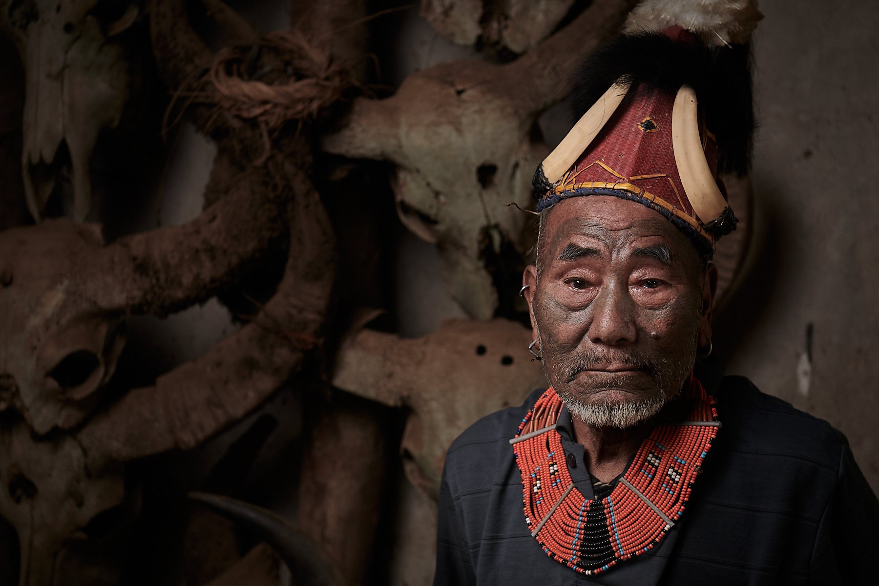 Konyak headhunter inside a morong, Longkhum village, Nagaland